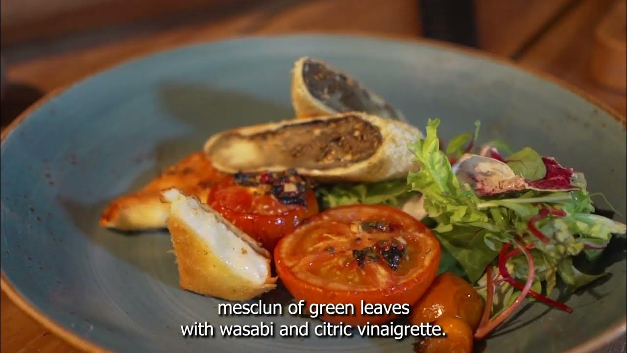 SMOKED TOMATOES, BREADED EGGPLANT AND PROVOLONE WITH MESCLUN OF LEAVES, WASABI AND CITRIC VINAIGRETTE