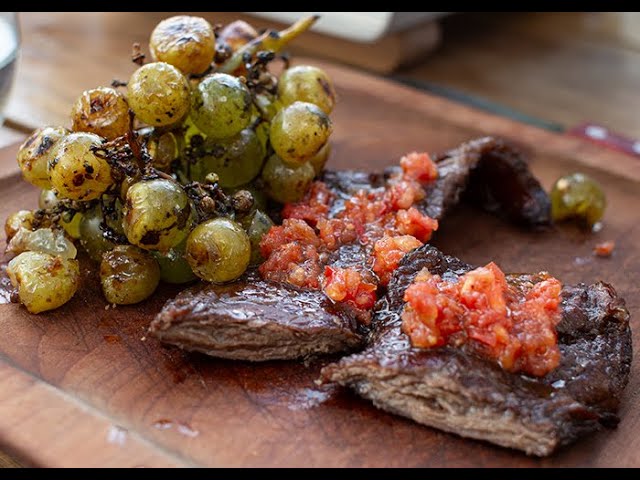 SKIRT STEAK WITH LLAJUA SAUCE AND BURNT GRAPES